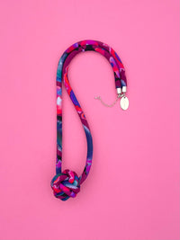 Collar Bola - multicolor morado/burdeo/rojo